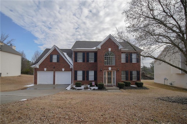 colonial home with a garage