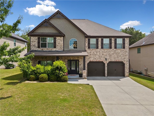 craftsman-style house featuring a garage, concrete driveway, brick siding, and a front yard