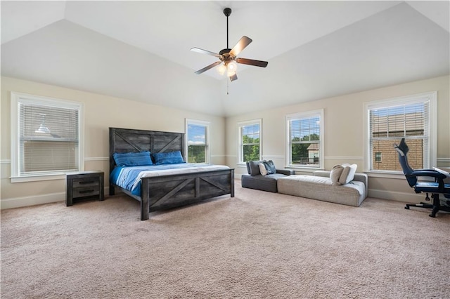 bedroom with baseboards, ceiling fan, vaulted ceiling, and carpet flooring