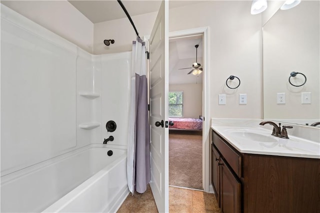 bathroom featuring ceiling fan, tile patterned flooring, shower / bath combo, vanity, and ensuite bathroom