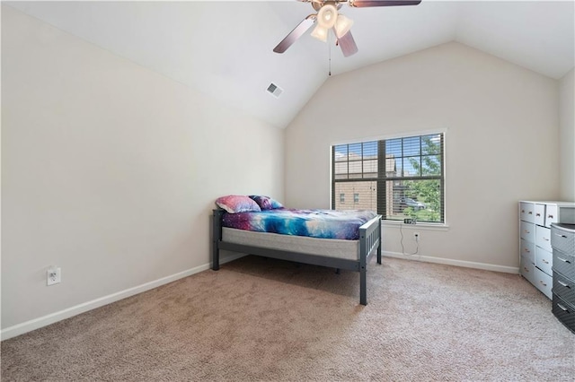 bedroom with visible vents, baseboards, light colored carpet, a ceiling fan, and vaulted ceiling