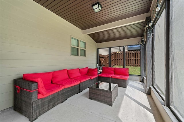 view of patio / terrace featuring fence and an outdoor hangout area