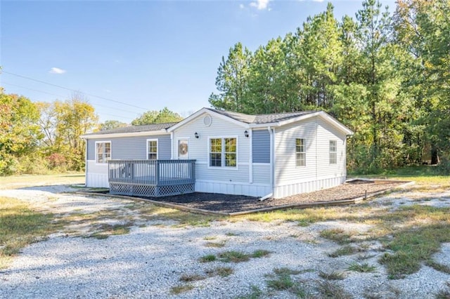 view of front of home with a wooden deck