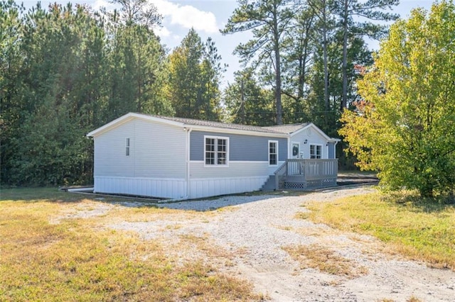 view of front of house with a deck