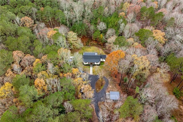 single story home with covered porch and a front yard