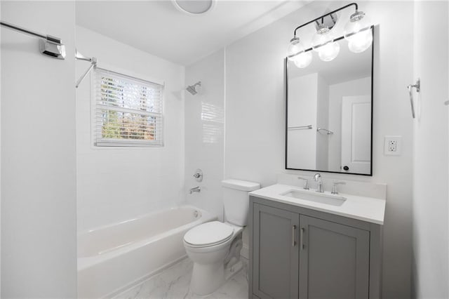 full bathroom featuring marble finish floor, bathing tub / shower combination, vanity, and toilet