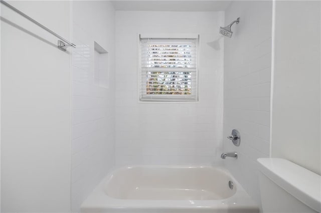 full bath featuring bathing tub / shower combination and toilet