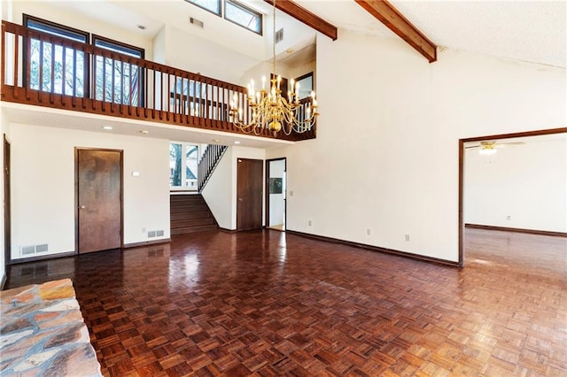 unfurnished living room featuring high vaulted ceiling, stairway, visible vents, and beamed ceiling