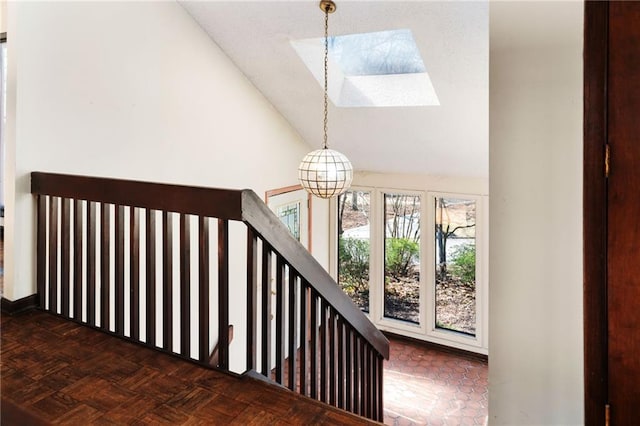 stairs featuring lofted ceiling