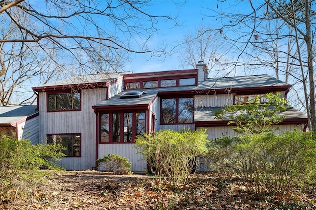 view of front of home with a chimney