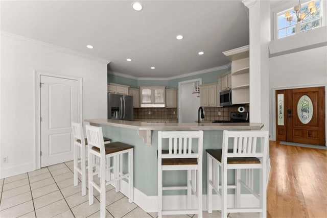 4514 Walking Stick Ln, Gainesville, GA 30506 - kitchen with stainless steel appliances, recessed lighting, backsplash, open shelves, and a peninsula
