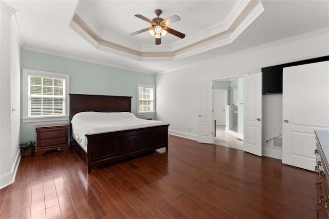 4514 Walking Stick Ln, Gainesville, GA 30506 - bedroom with multiple windows, crown molding, a raised ceiling, hardwood / wood-style flooring, and baseboards