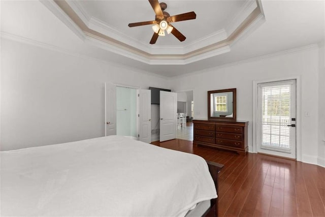 4514 Walking Stick Ln, Gainesville, GA 30506 - bedroom featuring ornamental molding, a raised ceiling, dark wood-type flooring, a ceiling fan, and baseboards