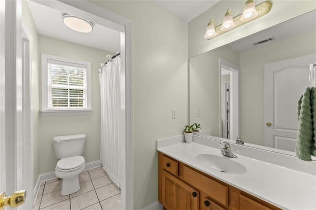 4514 Walking Stick Ln, Gainesville, GA 30506 - bathroom with vanity, toilet, tile patterned flooring, baseboards, and a shower with curtain