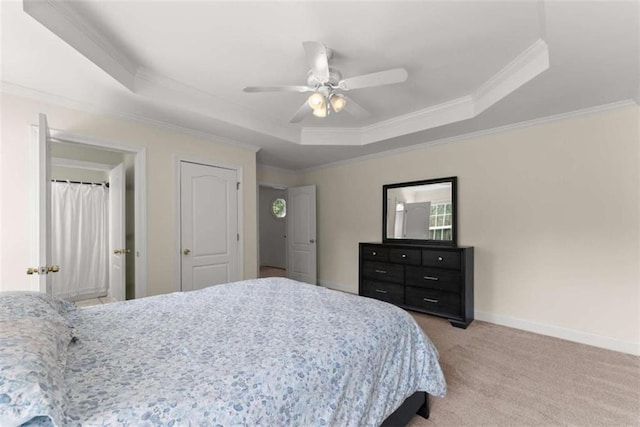 4514 Walking Stick Ln, Gainesville, GA 30506 - bedroom featuring a raised ceiling, crown molding, light colored carpet, a ceiling fan, and baseboards