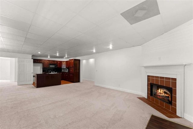 4514 Walking Stick Ln, Gainesville, GA 30506 - unfurnished living room with a tile fireplace, light carpet, and baseboards