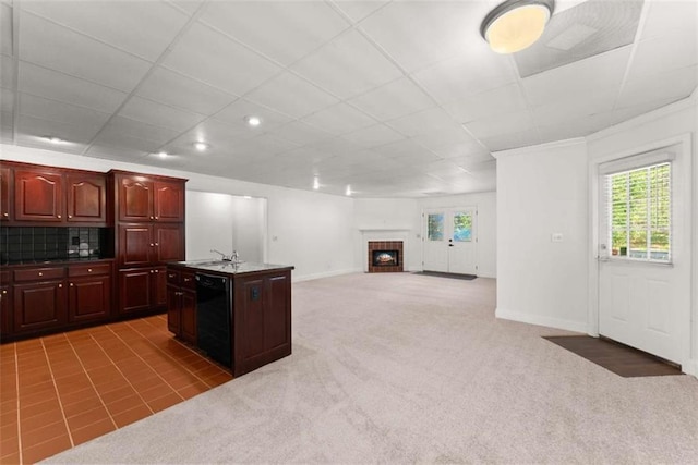 4514 Walking Stick Ln, Gainesville, GA 30506 - kitchen featuring dishwasher, an island with sink, light carpet, baseboards, and a paneled ceiling
