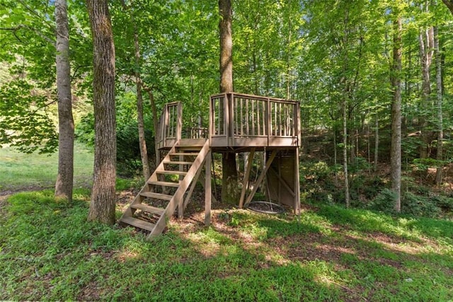 4514 Walking Stick Ln, Gainesville, GA 30506 - view of jungle gym with stairs, a wooden deck, and a view of trees