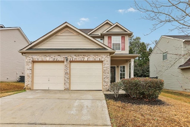 craftsman-style house with a garage and central AC