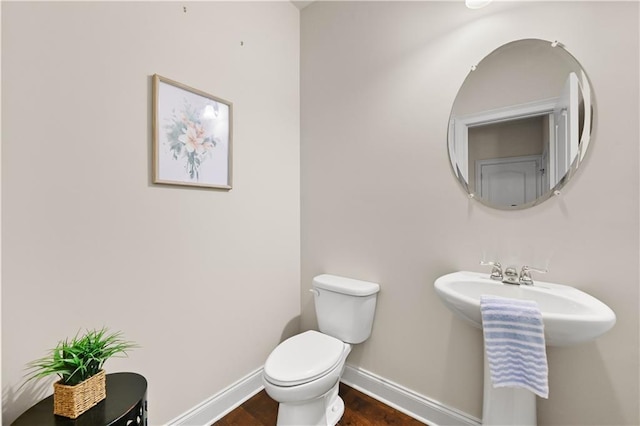 2396 Whiteoak Bnd SE Unit 16, Smyrna, GA 30080 - half bath with toilet, baseboards, and wood finished floors