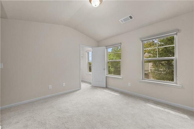 2396 Whiteoak Bnd SE Unit 16, Smyrna, GA 30080 - spare room with vaulted ceiling, baseboards, and carpet flooring