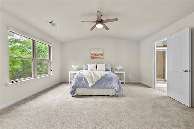 2396 Whiteoak Bnd SE Unit 16, Smyrna, GA 30080 - bedroom with lofted ceiling, carpet floors, baseboards, connected bathroom, and a ceiling fan