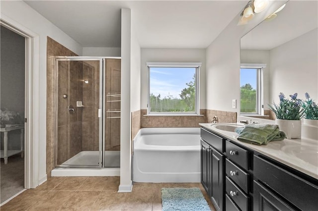 2396 Whiteoak Bnd SE Unit 16, Smyrna, GA 30080 - full bathroom with a bath, a stall shower, double vanity, and tile patterned flooring