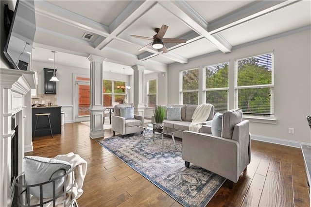 2396 Whiteoak Bnd SE Unit 16, Smyrna, GA 30080 - living area with decorative columns, ceiling fan, dark wood-style floors, baseboards, and beam ceiling