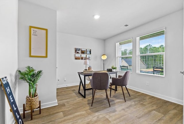 734 Great Oak Pl, Villa Rica, GA 30180 - dining space featuring visible vents, baseboards, recessed lighting, and wood finished floors