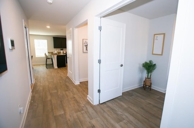 734 Great Oak Pl, Villa Rica, GA 30180 - corridor featuring baseboards, recessed lighting, and wood finished floors