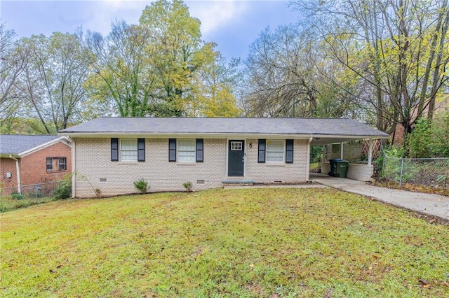 single story home featuring a carport and a front yard