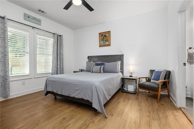 bedroom featuring ceiling fan and hardwood / wood-style floors