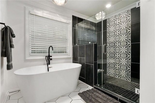 bathroom featuring independent shower and bath and tile patterned floors