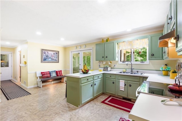 599 Palmer Ct SE, Conyers, GA 30094 - kitchen with sink, light tile flooring, and green cabinets