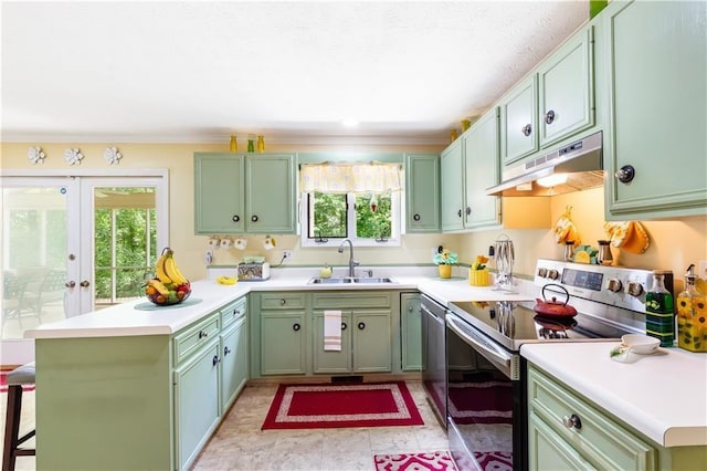 599 Palmer Ct SE, Conyers, GA 30094 - kitchen featuring green cabinets, a healthy amount of sunlight, sink, and stainless steel electric range