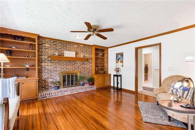 599 Palmer Ct SE, Conyers, GA 30094 - unfurnished living room featuring a textured ceiling, ceiling fan, hardwood / wood-style floors, and a fireplace
