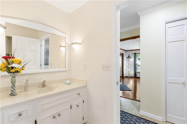 599 Palmer Ct SE, Conyers, GA 30094 - bathroom featuring crown molding, wood-type flooring, and vanity