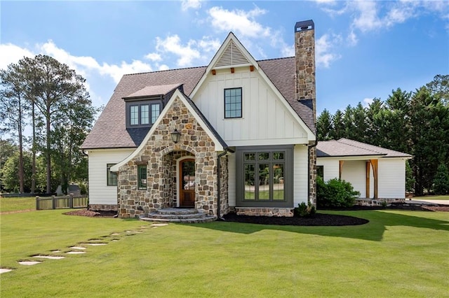 1830 Maple St, Carrollton, GA 30117 - view of front of property with a chimney, stone siding, board and batten siding, and a shingled roof