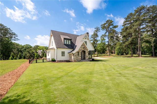 1830 Maple St, Carrollton, GA 30117 - view of front facade featuring a front lawn, a chimney, and stone siding