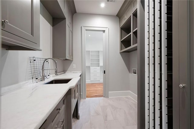 1830 Maple St, Carrollton, GA 30117 - washroom with cabinet space, hookup for a washing machine, light marble finish flooring, baseboards, and recessed lighting