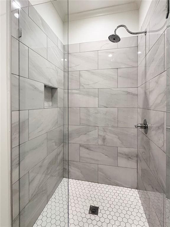 1830 Maple St, Carrollton, GA 30117 - bathroom with tiled shower and crown molding