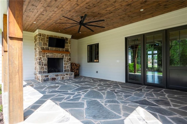 1830 Maple St, Carrollton, GA 30117 - view of patio featuring an outdoor stone fireplace and a ceiling fan
