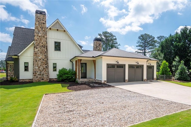 1830 Maple St, Carrollton, GA 30117 - modern inspired farmhouse with a chimney, an attached garage, concrete driveway, a front yard, and board and batten siding