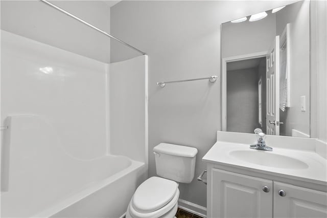 full bathroom with toilet, vanity, and shower / bath combination