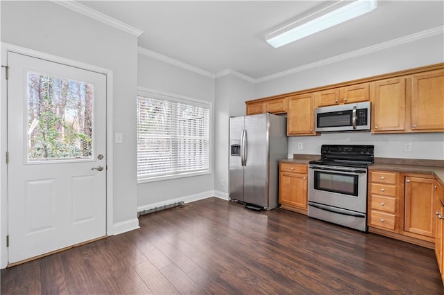 kitchen featuring stainless steel appliances, dark hardwood / wood-style flooring, and crown molding