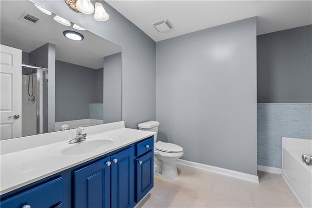 full bathroom with toilet, vanity, tile walls, and separate shower and tub