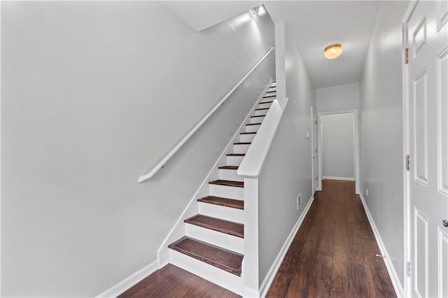 stairway featuring hardwood / wood-style floors