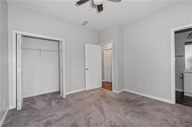 unfurnished bedroom featuring carpet floors, ceiling fan, and a closet