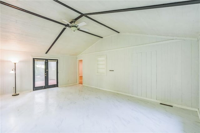 364 Stafford St SW, Marietta, GA 30064 - spare room featuring vaulted ceiling, ceiling fan, french doors, and wooden walls