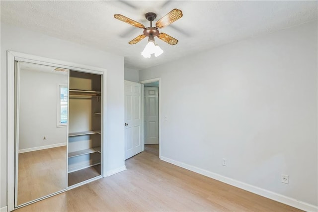 364 Stafford St SW, Marietta, GA 30064 - unfurnished bedroom with wood finished floors, a closet, and ceiling fan